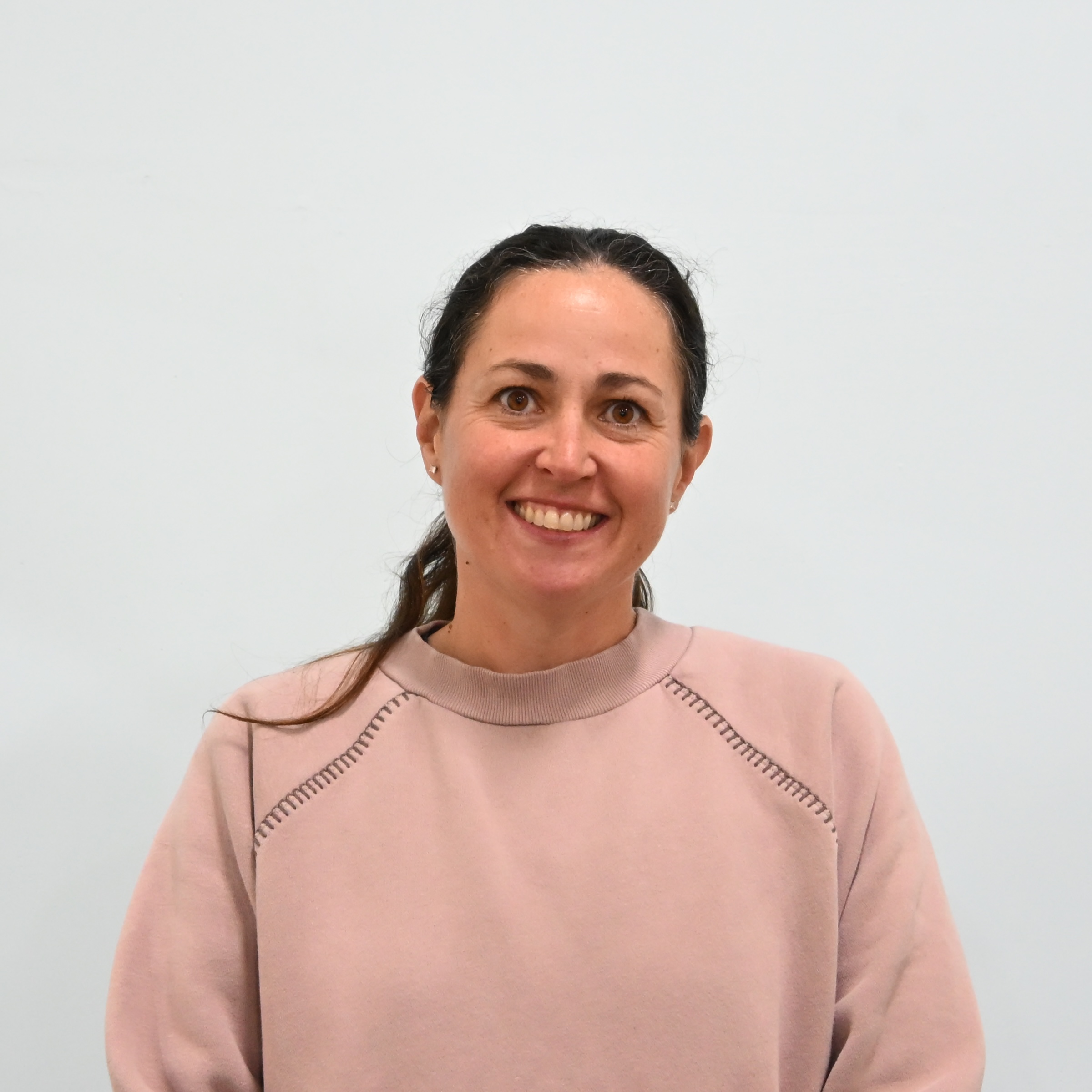 A headshot of Angela Dauch.